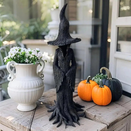 Hand-painted resin witch garden statue in earth tones