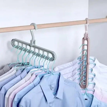 Space-saving hanger holding shirts in a wardrobe