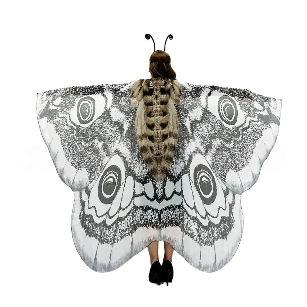 Moth wing cape worn as a festival wrap