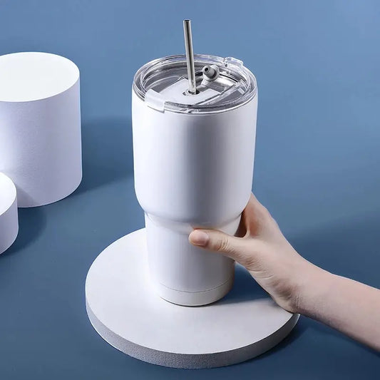Insulated stainless steel travel mug with slide lid