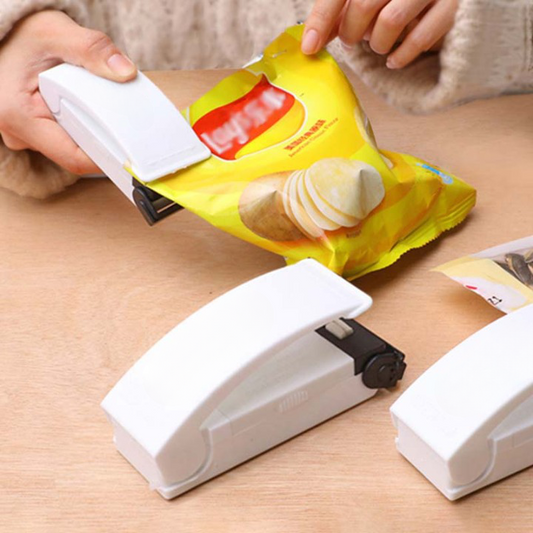 Portable cordless bag sealer for resealing food bags